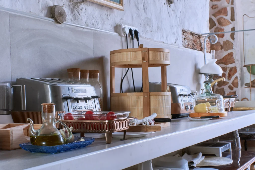 Exterior architectural photography of Castell Granadella, a luxury boutique hotel in Spain, highlighting the rustic-modern design and exclusive setting.