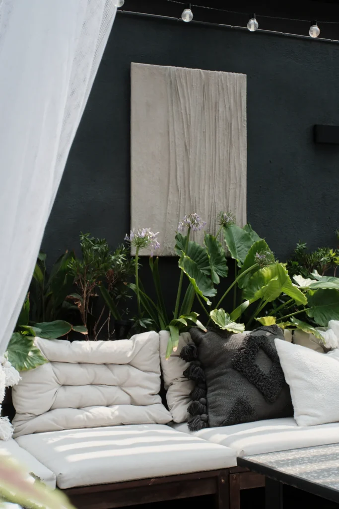 Cozy natural light interior photography, showcasing a minimalist reading corner with warm textures and inviting home decor styling