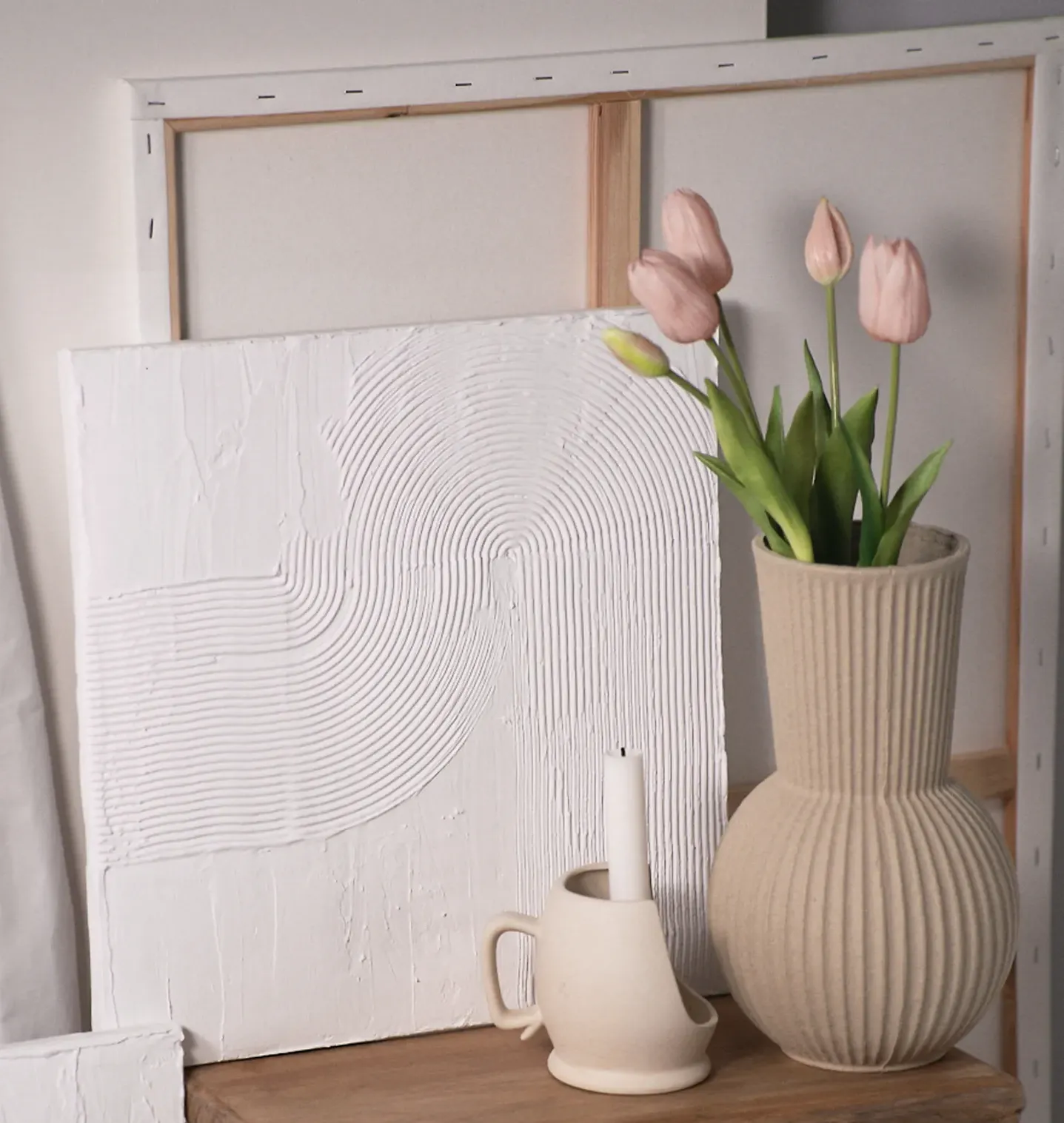 Still life product photography of minimalist textured wall art and vases, showcasing modern home decor and interior styling for e-commerce