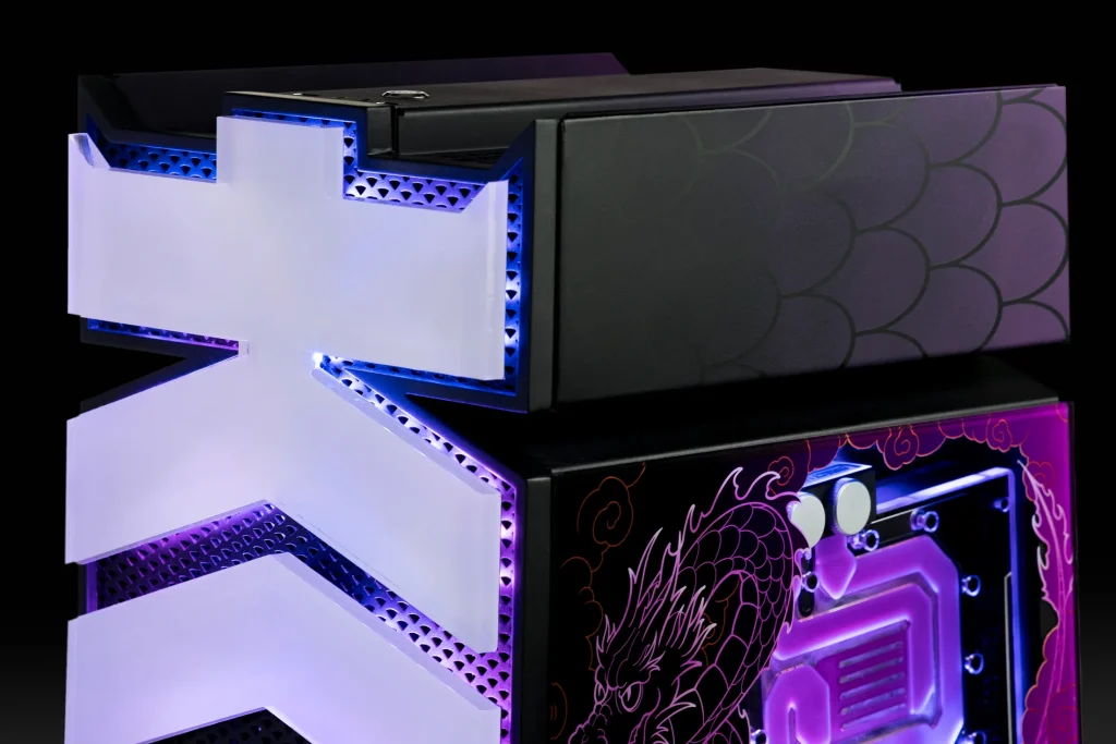 Full front view of the KOI Custom Gaming PC tower with the white KOI logo, top panel with scale design, and purple-lit dragon art.