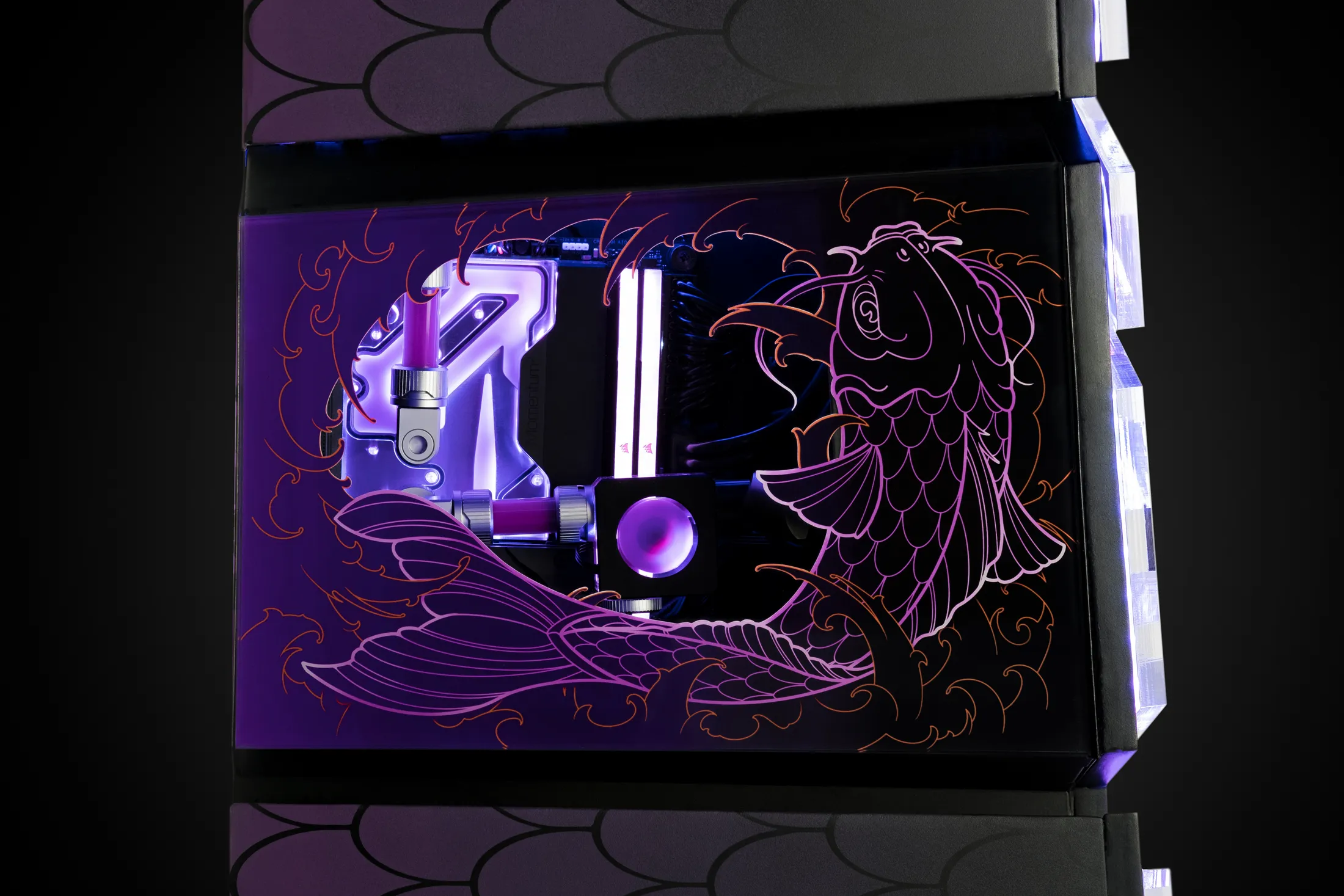 Custom KOI PC side panel featuring a large etched Koi fish design, revealing the interior water cooling system with purple RGB lighting.