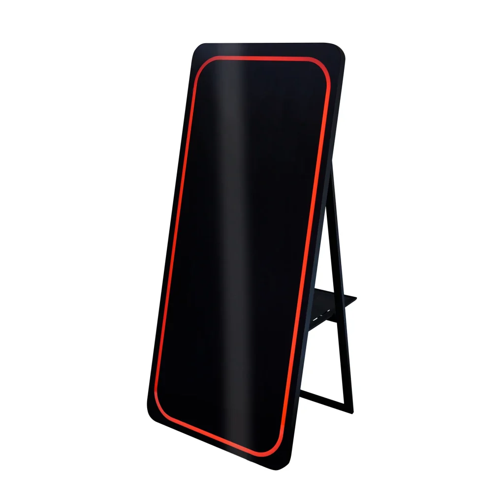 Black Magic Mirror photo booth on a stand with a glowing red LED outline, displayed on a white background.